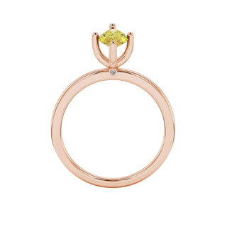 Marquise cut canary yellow gemstone ring, rose gold surprise diamond setting.