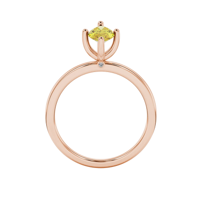 Marquise cut canary yellow gemstone ring, rose gold surprise diamond setting.