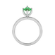 Marquise cut emerald green gemstone ring, white gold surprise diamond setting.