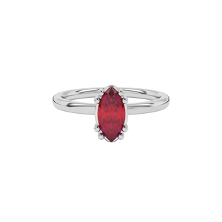 Close-up marquise cut raspberry red gemstone ring, white gold vintage basket.