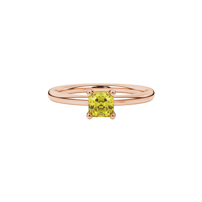 Asscher cut gemstone solitaire ring in gold with four-prong setting