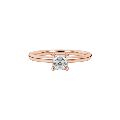 Asscher cut gemstone solitaire ring in gold with four-prong setting