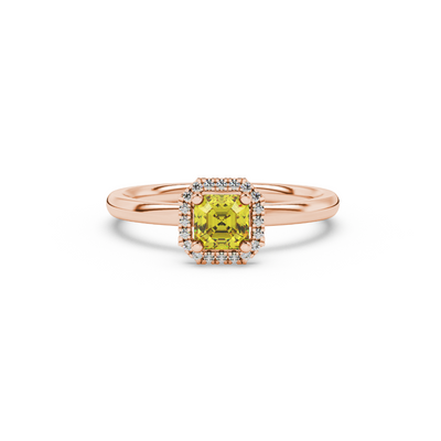 Asscher cut halo gemstone ring in gold featuring a 5.00 MM center gemstone surrounded by round diamond accents