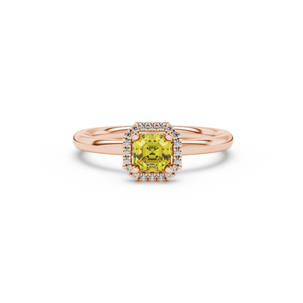 Asscher cut halo gemstone ring in gold featuring a 5.00 MM center gemstone surrounded by round diamond accents