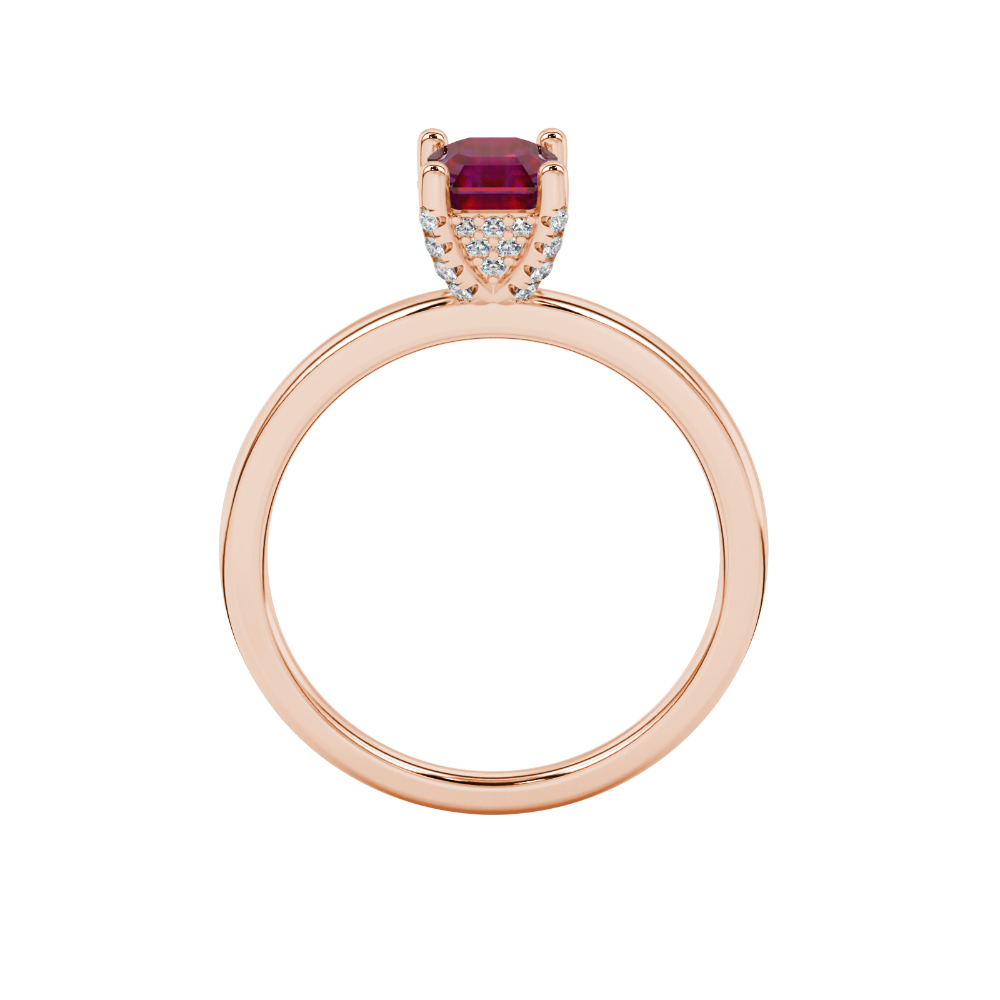 Emerald cut hidden halo solitaire ring in gold featuring a 5.00 MM center gemstone secured in a four-prong setting