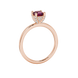 Emerald cut hidden halo solitaire ring in gold featuring a 5.00 MM center gemstone secured in a four-prong setting