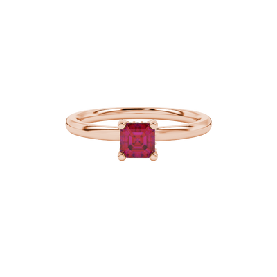 Emerald cut hidden halo solitaire ring in gold featuring a 5.00 MM center gemstone secured in a four-prong setting