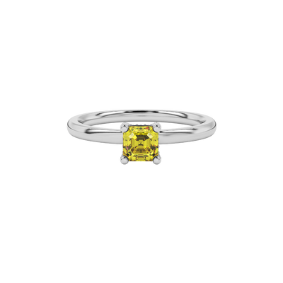 Emerald cut hidden halo solitaire ring in gold featuring a 5.00 MM center gemstone secured in a four-prong setting