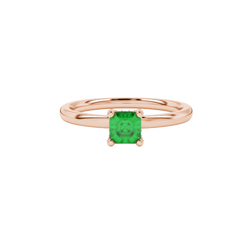 Emerald cut hidden halo solitaire ring in gold featuring a 5.00 MM center gemstone secured in a four-prong setting
