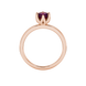 Asscher cut solitaire ring featuring a rich red gemstone secured in a six-prong crown setting crafted in gold