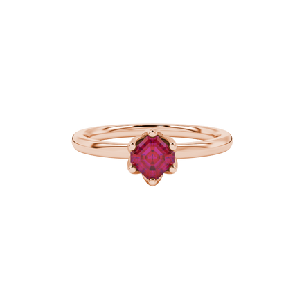 Asscher cut solitaire ring featuring a rich red gemstone secured in a six-prong crown setting crafted in gold