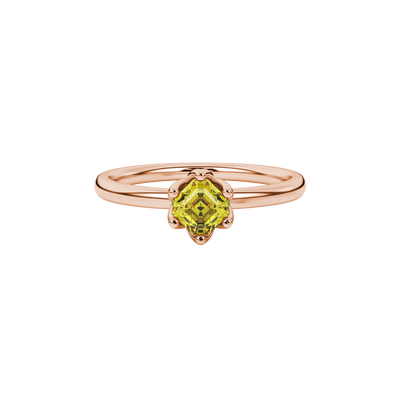 Asscher cut solitaire ring featuring a brilliant yellow gemstone secured in a six-prong crown setting crafted in gold