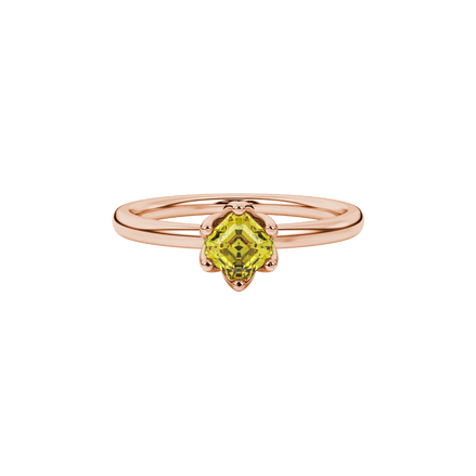 Asscher cut solitaire ring featuring a brilliant yellow gemstone secured in a six-prong crown setting crafted in gold