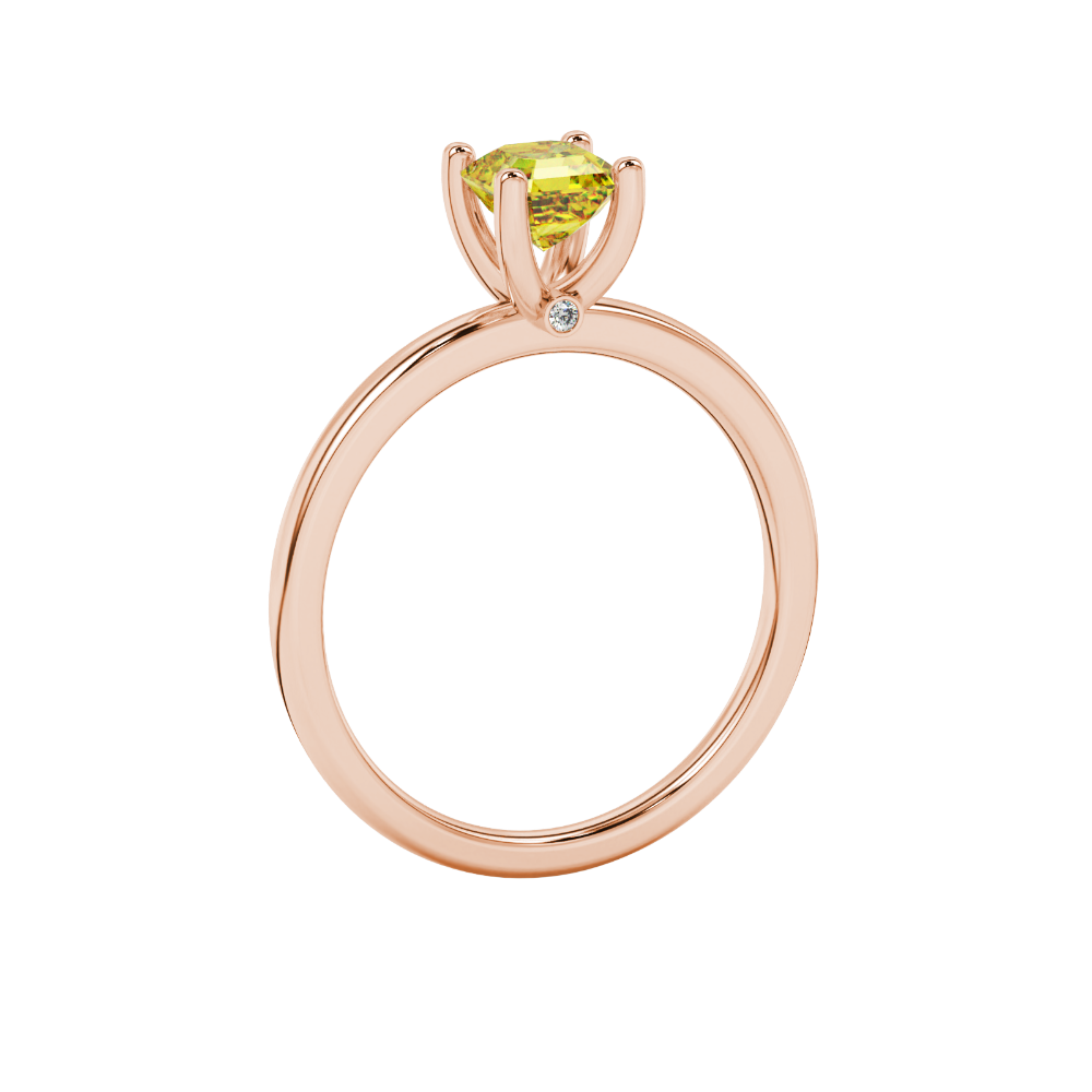Yellow Asscher cut solitaire ring in gold featuring a 5.00 MM gemstone in a classic four-prong cathedral setting