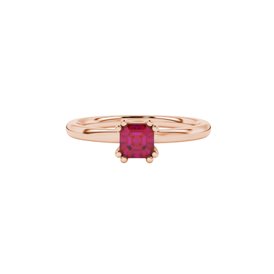 Red Asscher cut gemstone solitaire ring in gold featuring a refined six-prong basket setting