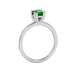 Green Asscher cut gemstone solitaire ring in gold featuring a refined six-prong basket setting
