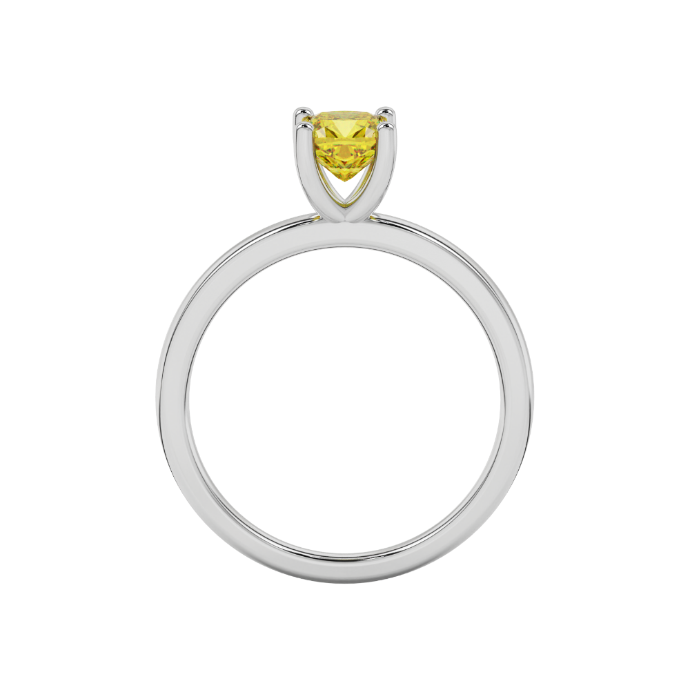 Yellow cushion cut gemstone solitaire ring in gold featuring a refined four-prong cathedral basket setting