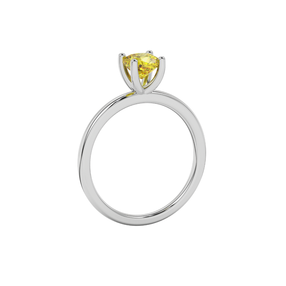 Yellow cushion cut gemstone solitaire ring in gold featuring a refined four-prong cathedral basket setting