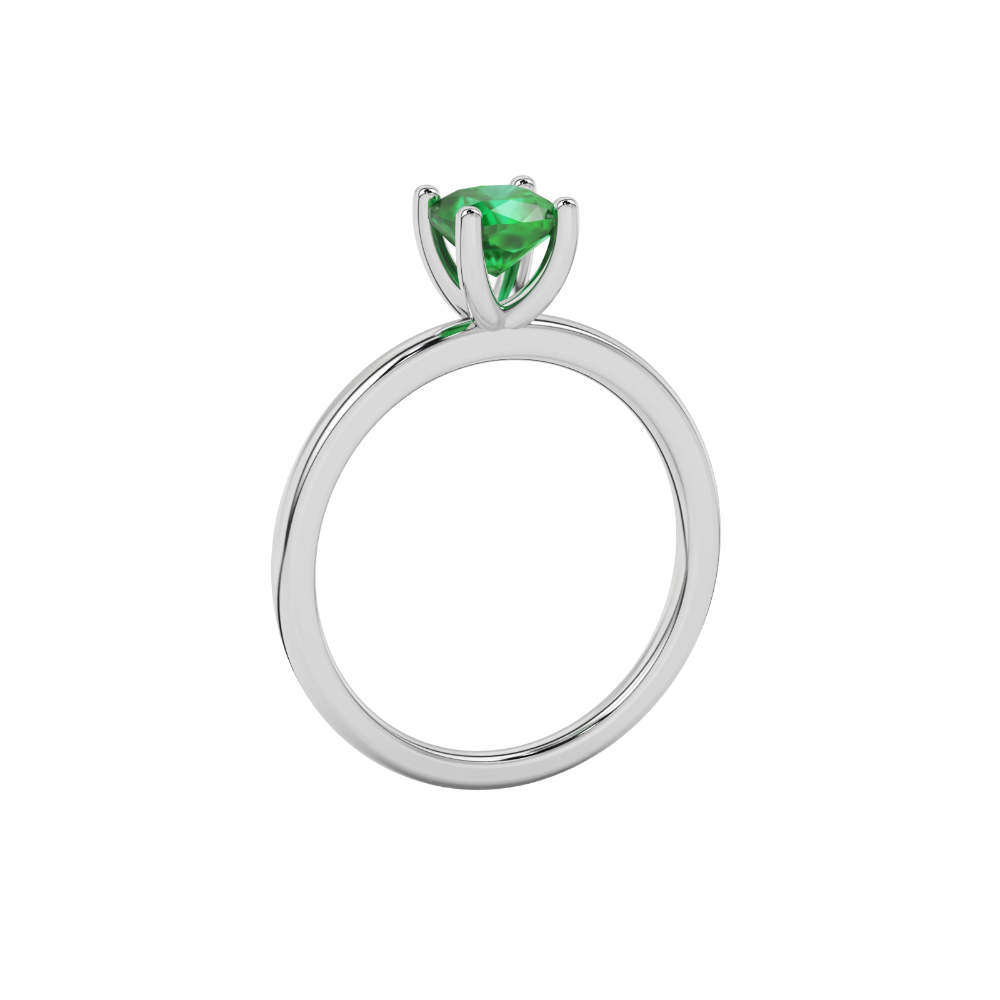 Green cushion cut gemstone solitaire ring in gold featuring a refined four-prong cathedral basket setting