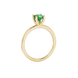Green cushion cut gemstone solitaire ring in gold featuring a refined four-prong cathedral basket setting