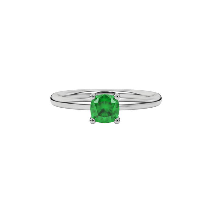 Green cushion cut gemstone solitaire ring in gold featuring a refined four-prong cathedral basket setting