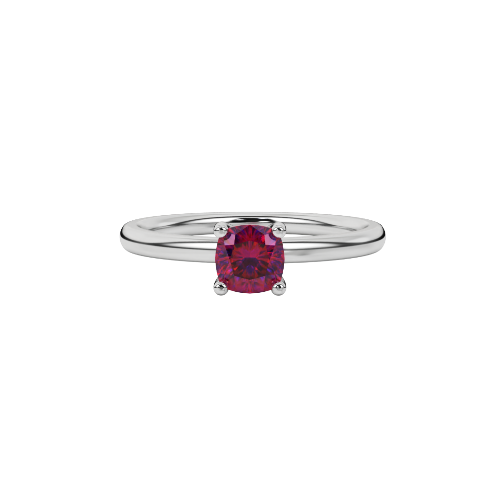 Red cushion cut gemstone solitaire ring in gold featuring a refined four-prong cathedral basket setting