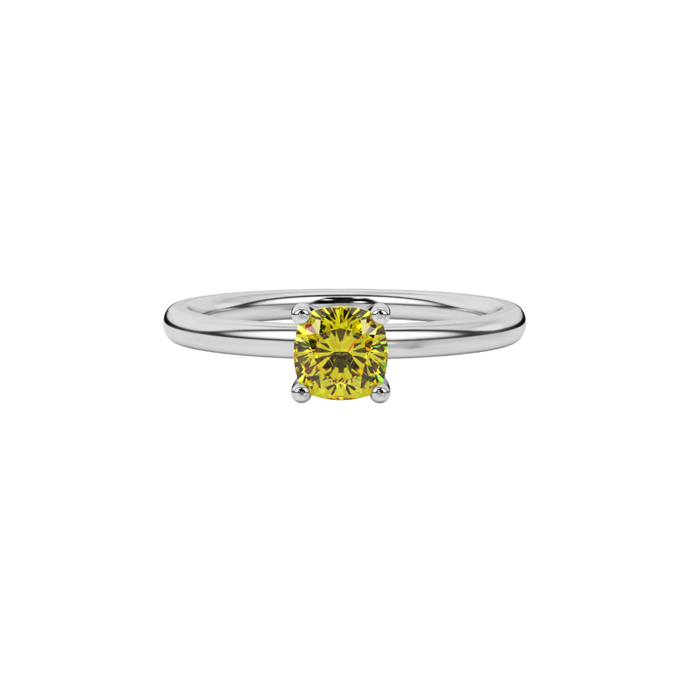 Yellow cushion cut gemstone solitaire ring in gold featuring a refined four-prong cathedral basket setting