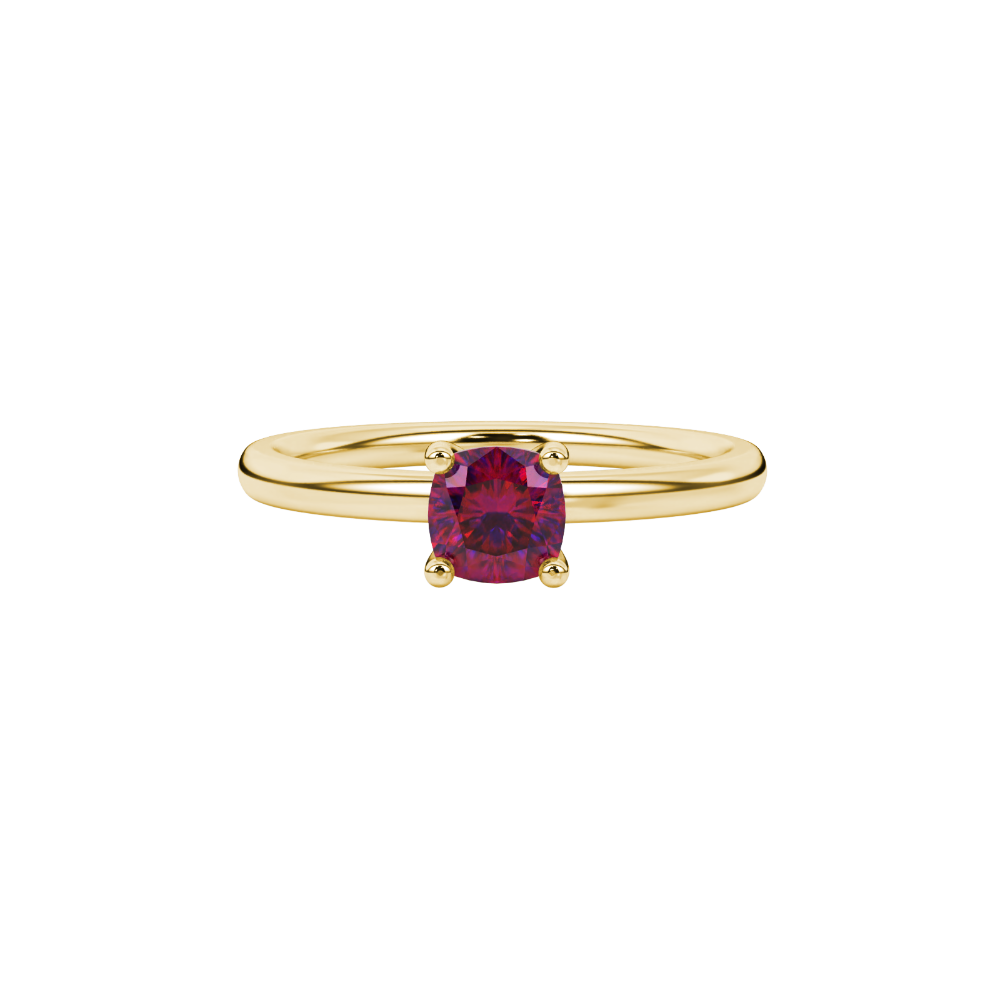 Red cushion cut gemstone solitaire ring in gold featuring a refined four-prong cathedral basket setting