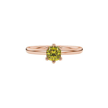 Yellow cushion cut gemstone solitaire ring in gold featuring a six-prong crown basket setting