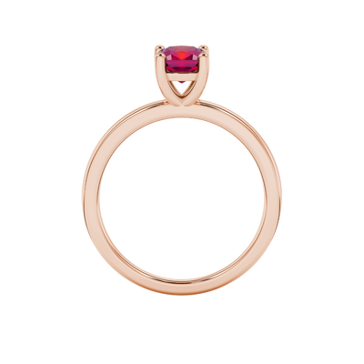 Red cushion cut solitaire gemstone ring in white gold four-prong setting