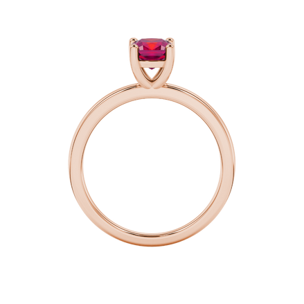 Red cushion cut solitaire gemstone ring in white gold four-prong setting