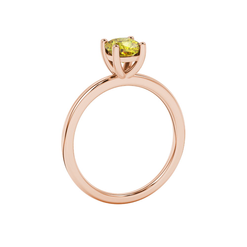 Yellow cushion cut solitaire gemstone ring in yellow gold four-prong setting