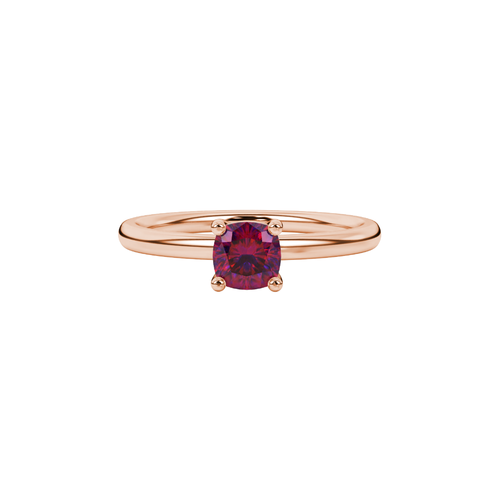Red cushion cut solitaire gemstone ring in white gold four-prong setting