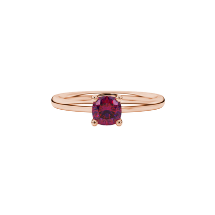 Red cushion cut solitaire gemstone ring in white gold four-prong setting