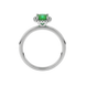 Green cushion cut gemstone halo ring with diamond accents in gold
