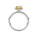 Yellow cushion cut gemstone halo ring with diamond accents in gold