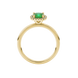Green cushion cut gemstone halo ring with diamond accents in gold