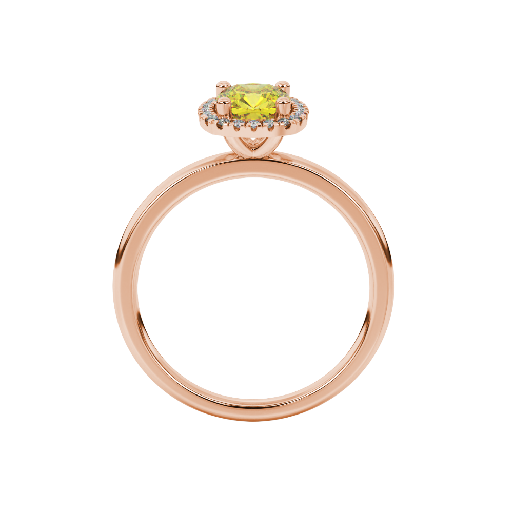 Yellow cushion cut gemstone halo ring with diamond accents in gold