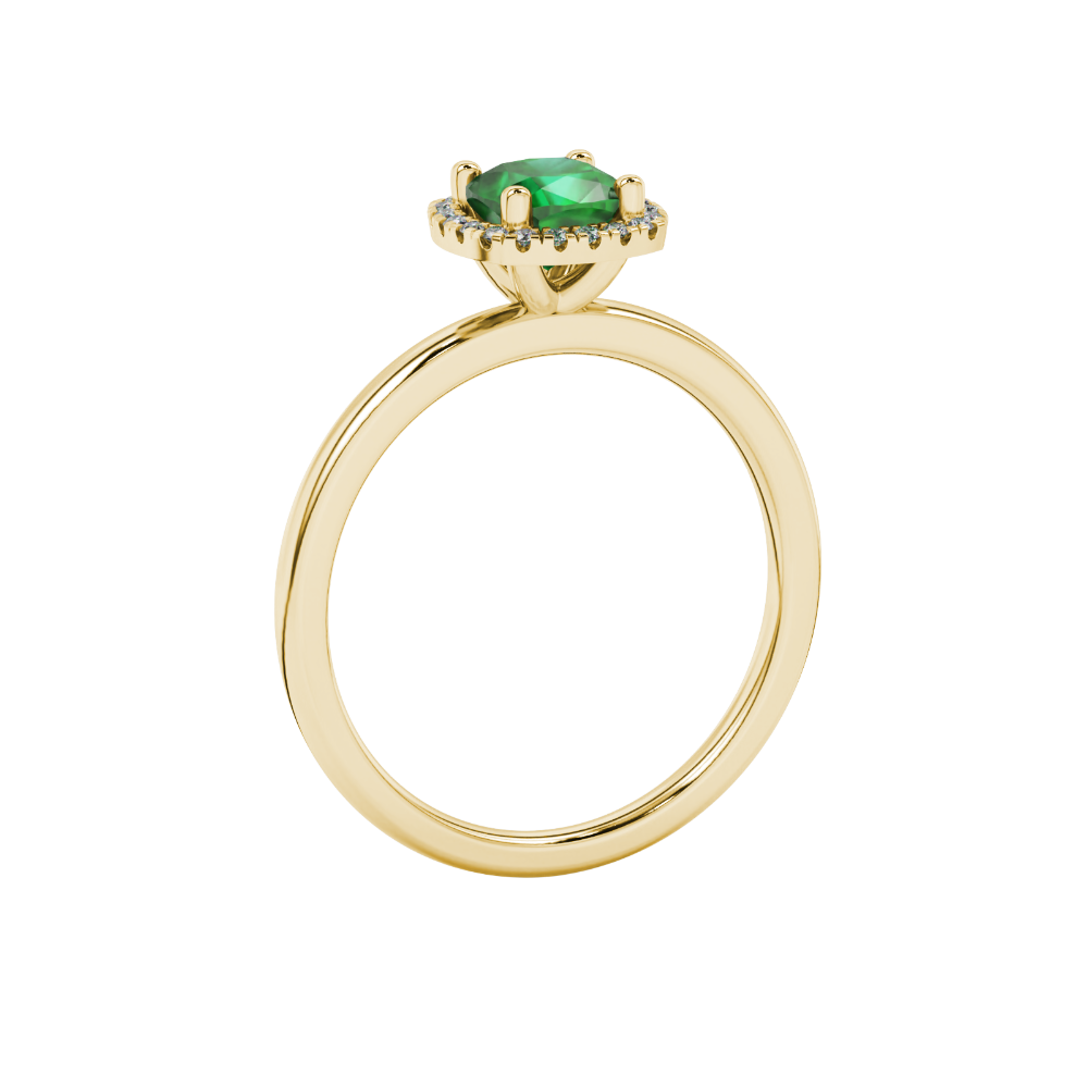 Green cushion cut gemstone halo ring with diamond accents in gold