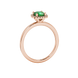 Green cushion cut gemstone halo ring with diamond accents in gold