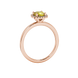 Yellow cushion cut gemstone halo ring with diamond accents in gold