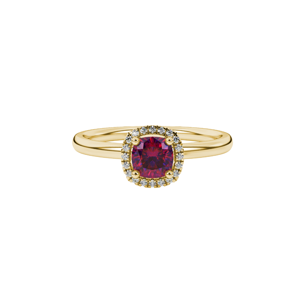 Red cushion cut gemstone halo ring with diamond accents in gold