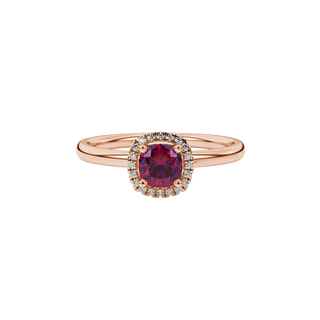 raspberry red gemstone halo ring in rose gold