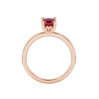 Red cushion cut solitaire gemstone ring in rose gold with classic four prong setting