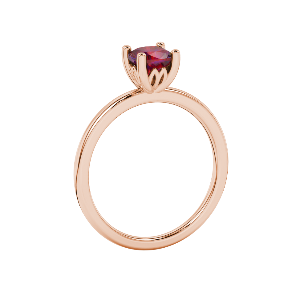 Red cushion cut solitaire gemstone ring in rose gold with classic four prong setting