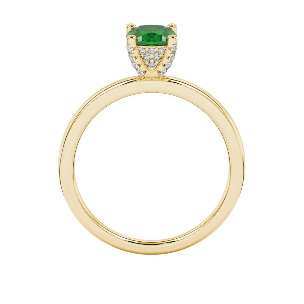 Green cushion cut gemstone ring with diamond gallery detailing in yellow gold