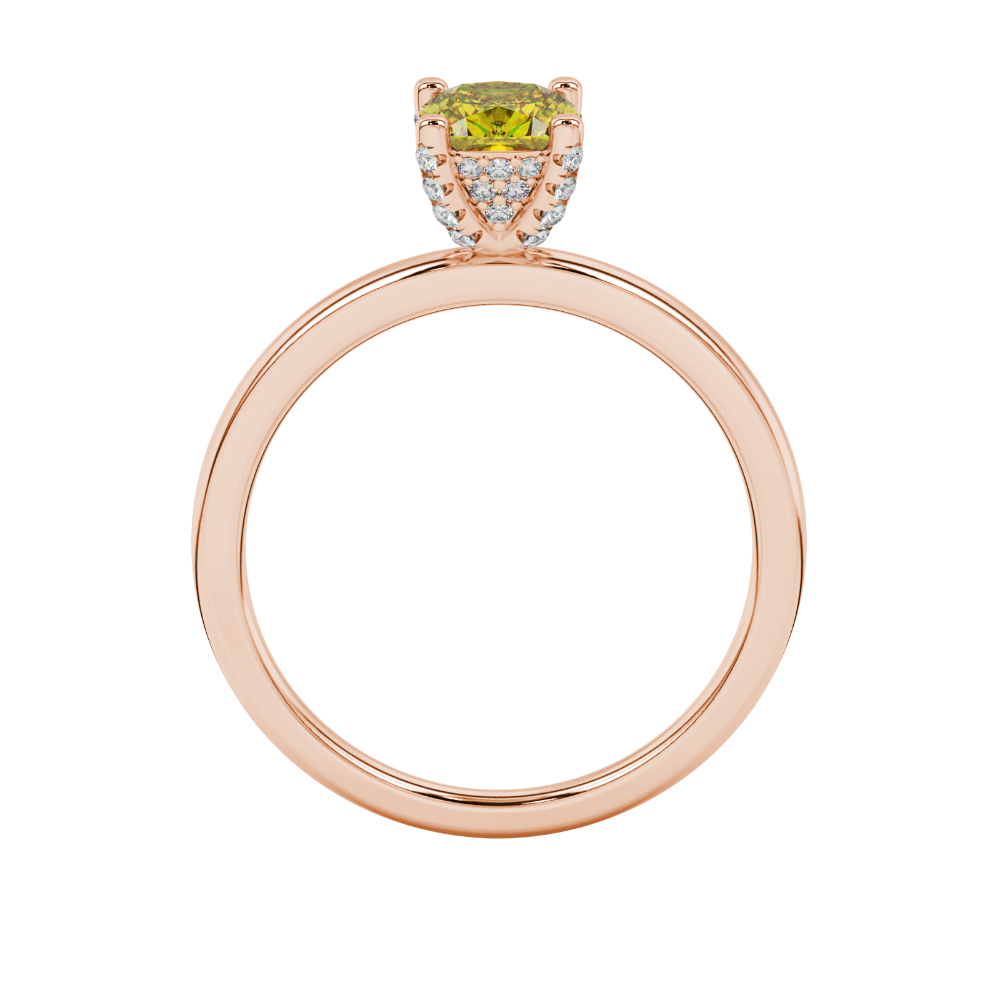 Yellow cushion cut gemstone ring with diamond gallery detailing in yellow gold