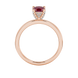 Red cushion cut gemstone ring with diamond gallery detailing in white gold