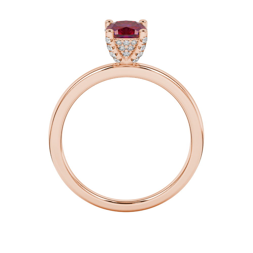Red cushion cut gemstone ring with diamond gallery detailing in white gold
