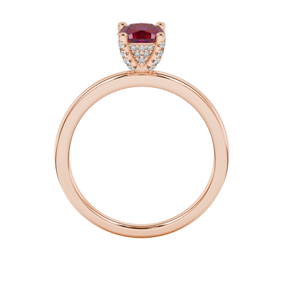 Red cushion cut gemstone ring with diamond gallery detailing in white gold